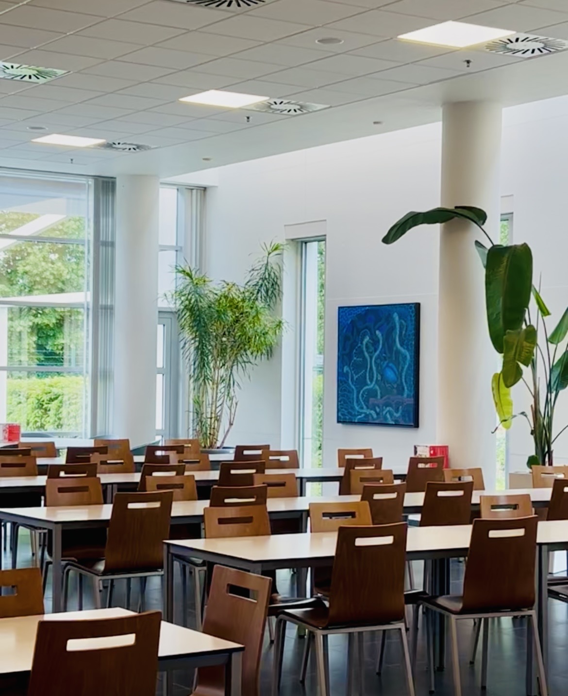 Large artworks in a company cafeteria