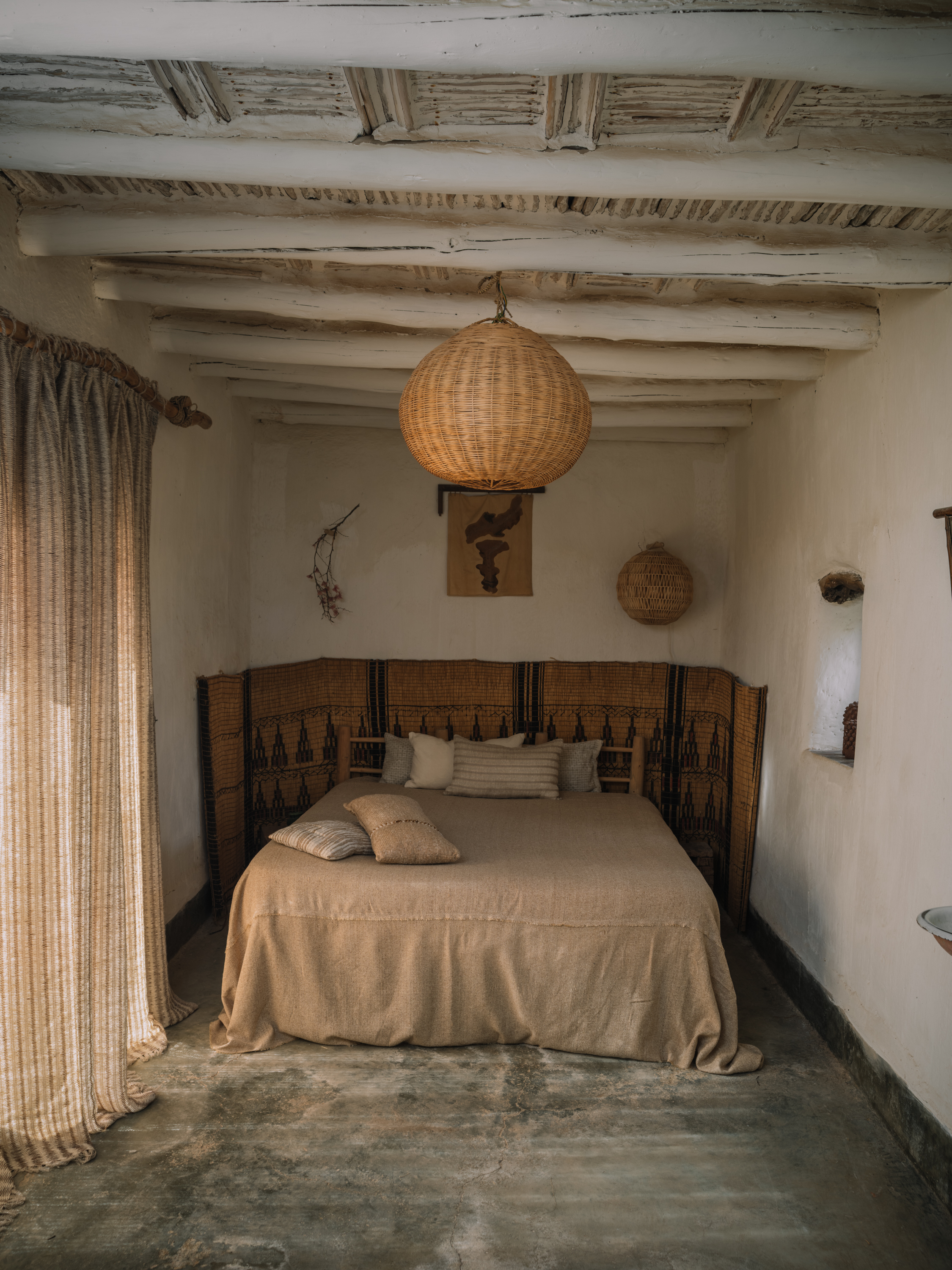 Curtain TARANGA YP26001 Cushions bedhead TARANGA YP26001, DHARTI YP26005, RIJU YP26001 photographed in Studio KO's traditional Moroccan farm for the Azimuth 2026 fabric collection by Designs of the Time