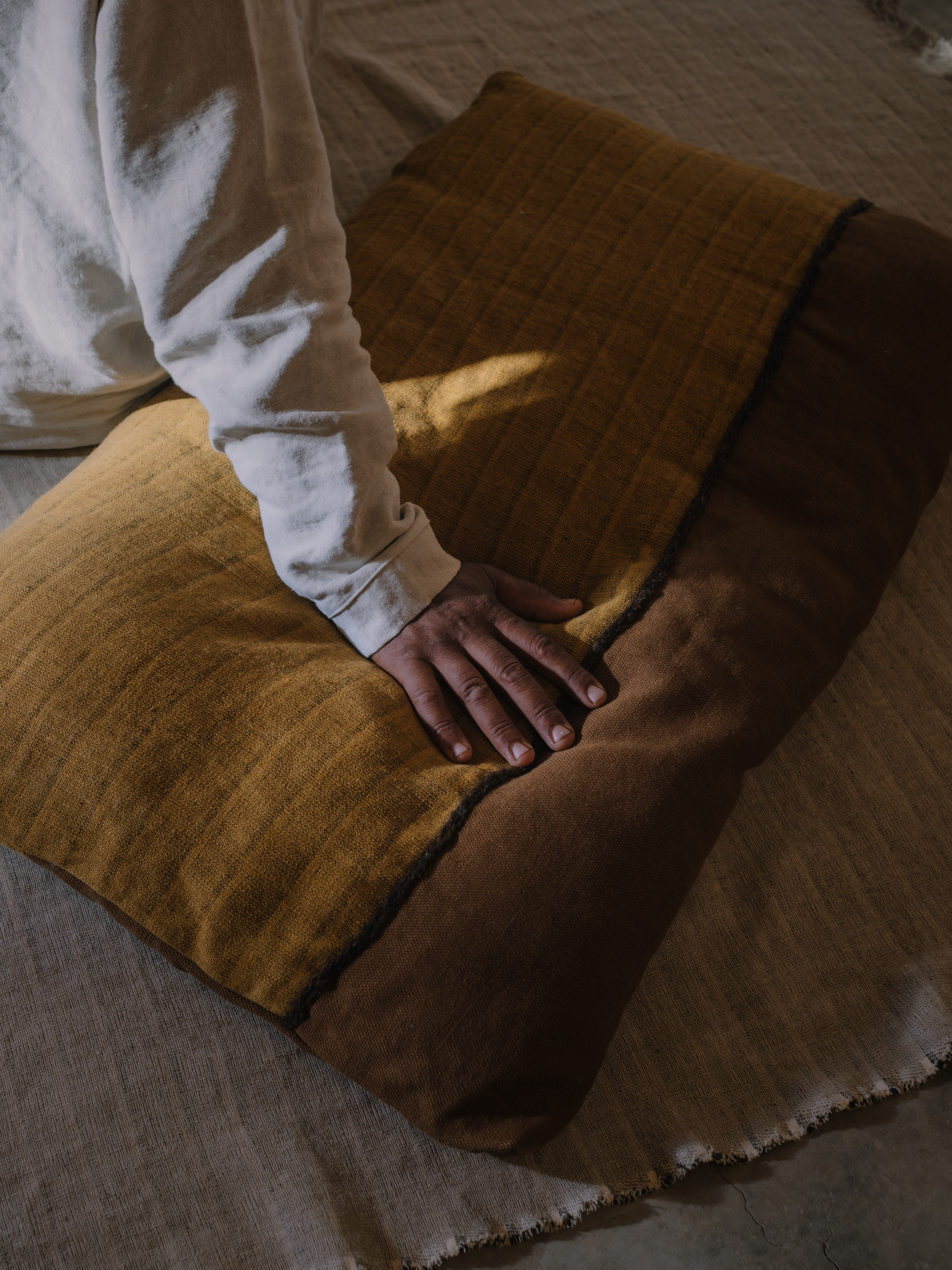 Cushion LETI YP26005, GRAVITAS YP26008 Carpet LETI YP26002, photographed in Studio KO's traditional Moroccan farm for the Azimuth 2026 fabric collection by Designs of the Time