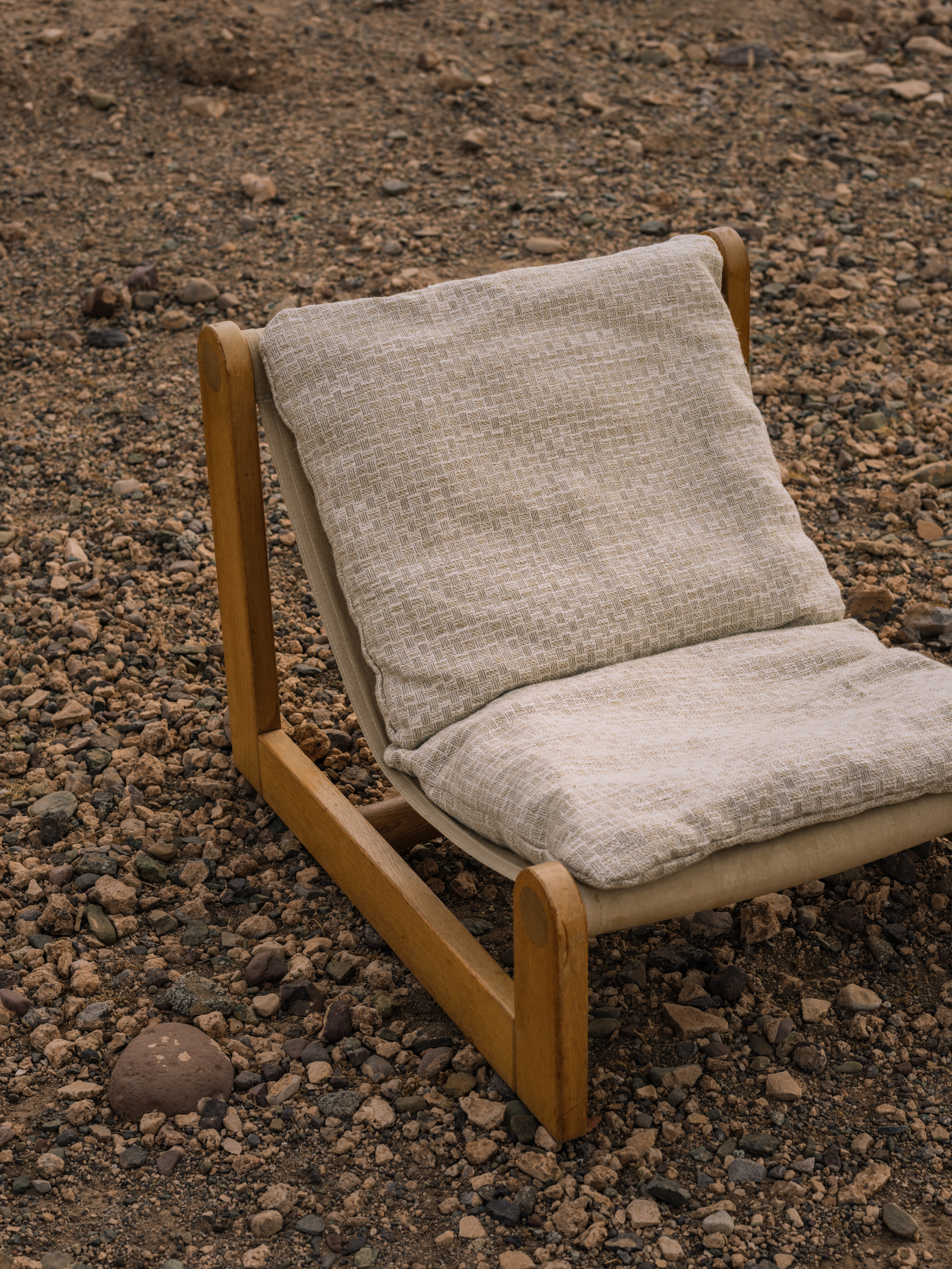 One seater cushion RIJU YP26001 photographed in the Moroccan desert for the Azimuth 2026 fabric collection by Designs of the Time