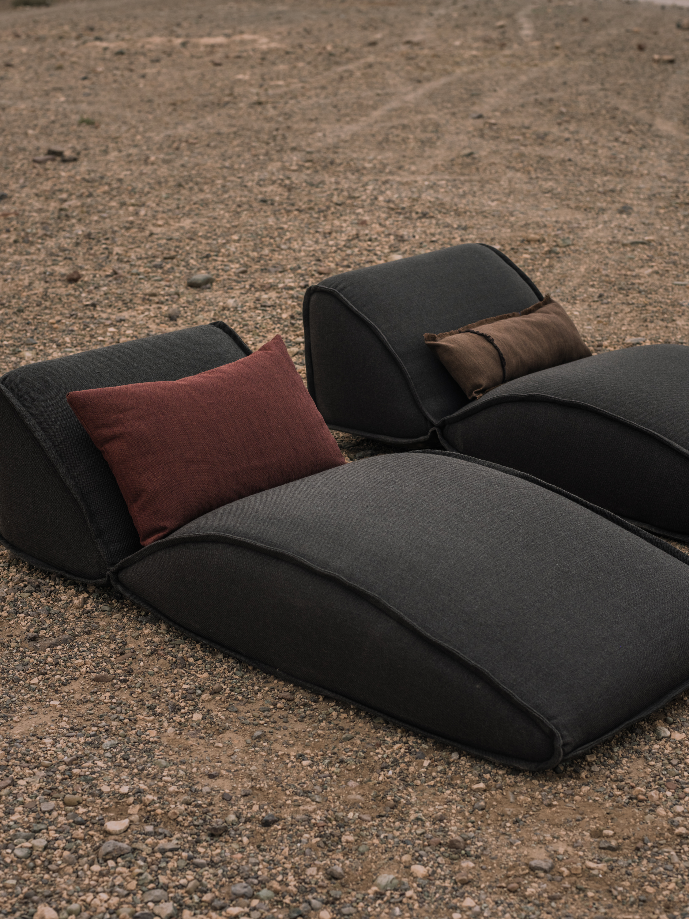 Outdoor daybeds TAR YP26009 Outdoor cushions SAKONDU YP25012, YP25014 photographed in the Moroccan desert for the Azimuth 2026 fabric collection by Designs of the Time