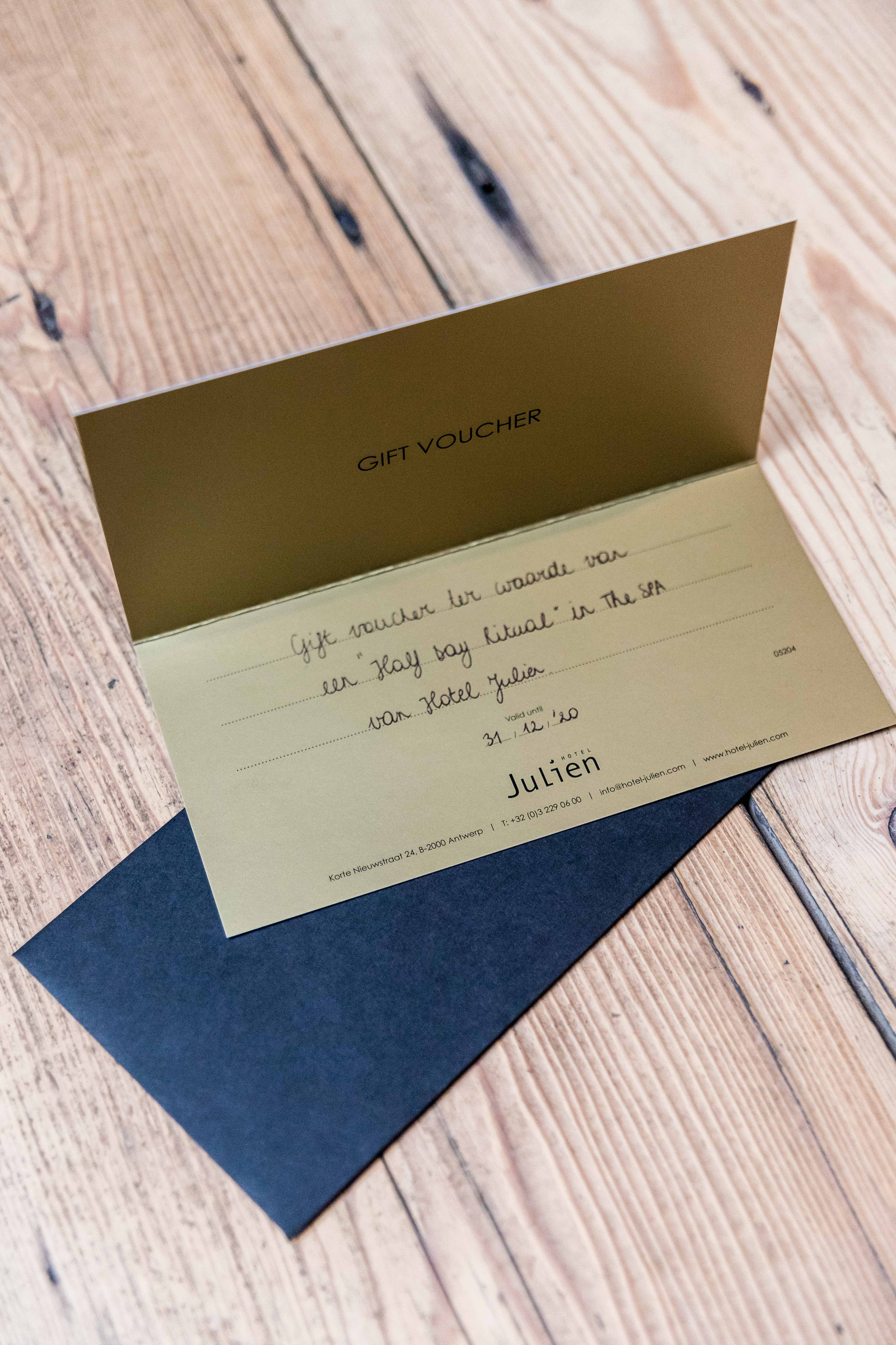 A giftcard printed on paper of gold